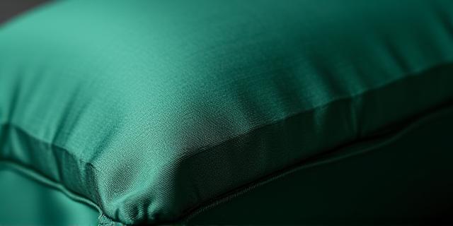 Close-up of hand-stitched silk pillow